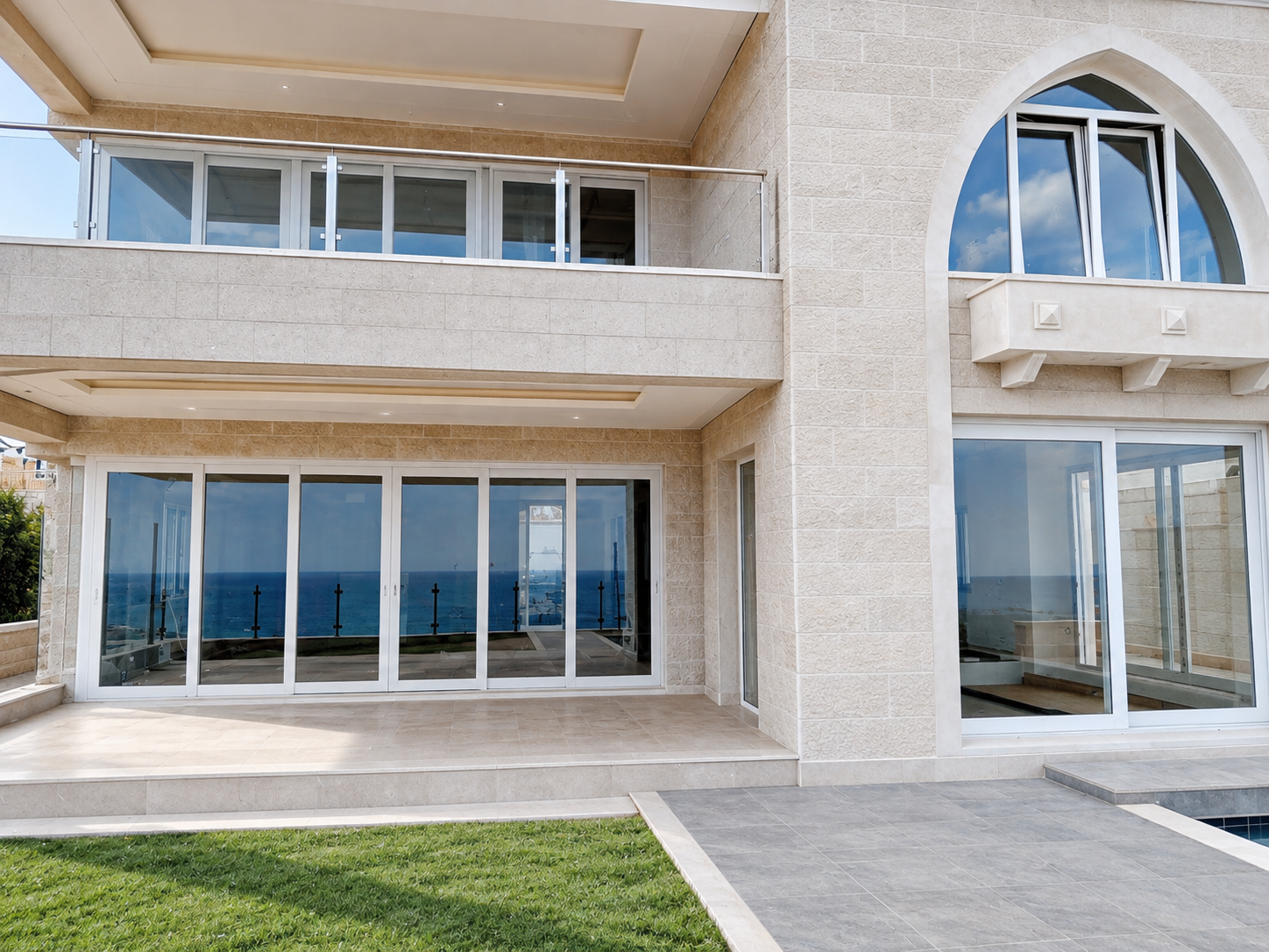 Modern Stone Villa with Glass Facade